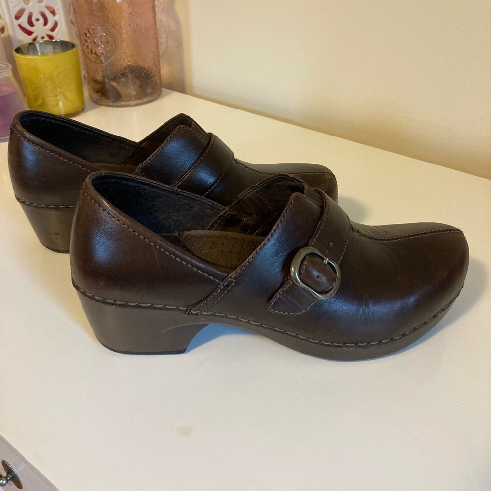 Dark brown Dansko clogs. Used good condition.